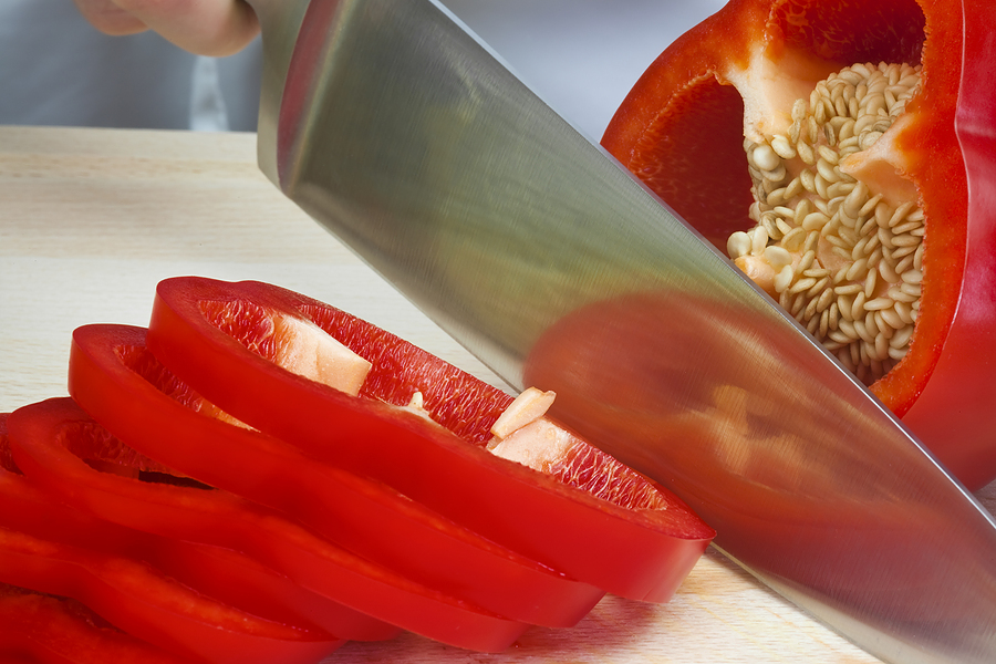 knife slicing pepper