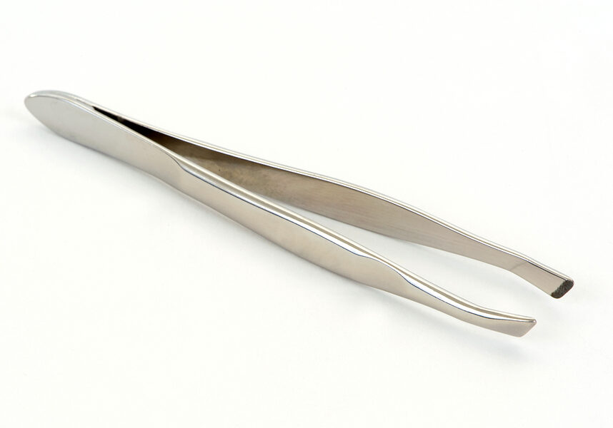 stainless steel grooming tweezers on a white background