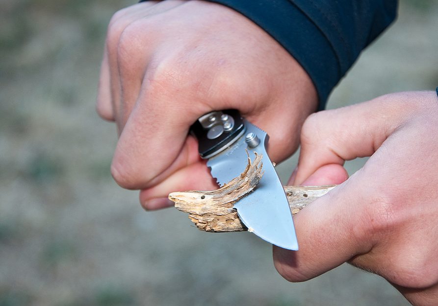 bigstock-Scout-Carving-Wood-8285347